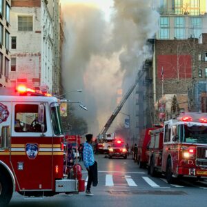NYCHA high-rise with self-closing apartment doors and fire-safety concerns